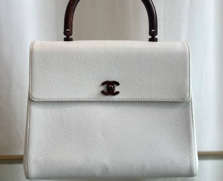 White Handbag in Your Collection