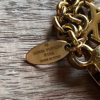 LOUIS VUITTON Gold Ivy Bag Brass Charm