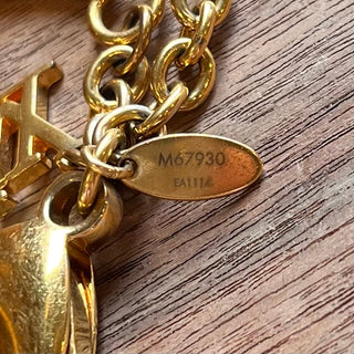 LOUIS VUITTON Gold Ivy Bag Brass Charm