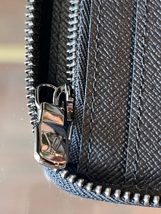 LOUIS VUITTON Monogram Eclipse Vertical Zippy Wallet