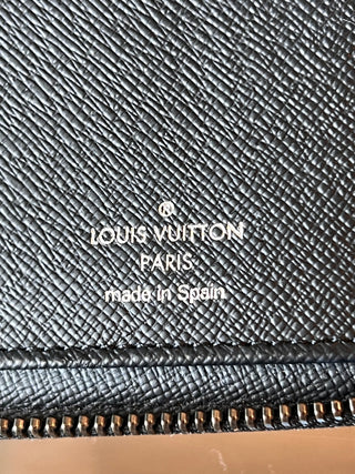 LOUIS VUITTON Monogram Eclipse Vertical Zippy Wallet