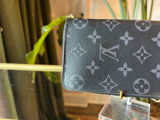 LOUIS VUITTON Monogram Eclipse Vertical Zippy Wallet