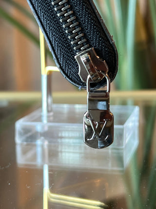 LOUIS VUITTON Monogram Eclipse Vertical Zippy Wallet